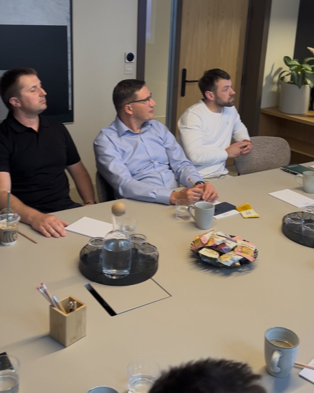 Founders and operators listening to the Vendo AI presentation at the London Business Club